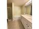 Bright bathroom featuring a shower, soaking tub, and a dual sink vanity offering ample space at 14022 Drake Watch Ln, Charlotte, NC 28262
