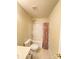 Clean bathroom with a shower-tub combo, toilet, and neutral-toned walls and floors at 14022 Drake Watch Ln, Charlotte, NC 28262