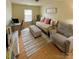 Bedroom with desk, pullout bed and chair, offering a versatile living space at 14022 Drake Watch Ln, Charlotte, NC 28262