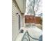 Relaxing patio area with a table and chairs, creating a cozy outdoor space at 14022 Drake Watch Ln, Charlotte, NC 28262