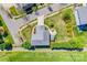 An aerial view showing the house's location, landscaped yard, brick patio, and street access at 14905 Skyscape Dr, Huntersville, NC 28078