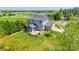 An aerial view of the backyard, patio, and home at 14905 Skyscape Dr, Huntersville, NC 28078