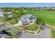 An aerial shot showcasing the two-story home with a spacious yard on a corner lot at 14905 Skyscape Dr, Huntersville, NC 28078