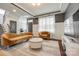 Cozy living room with large window, chic furnishings, and elegant interior design at 14905 Skyscape Dr, Huntersville, NC 28078