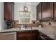 Kitchen features granite countertops, stainless steel appliances, and ample cabinet space at 2001 Cramer Place Ct, Cramerton, NC 28032