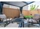 Inviting outdoor patio with comfortable seating around a modern fire pit table at 2001 Cramer Place Ct, Cramerton, NC 28032