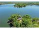Breathtaking aerial view of island property with lake access, perfect for boating and recreation at 2045 Manila Bay Ln, Tega Cay, SC 29708
