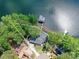 Aerial view of lakeside property showcasing location and proximity to lake and lush surroundings at 2045 Manila Bay Ln, Tega Cay, SC 29708