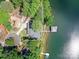 Aerial view of lakefront estate, highlighting its private setting and waterfront access at 2045 Manila Bay Ln, Tega Cay, SC 29708