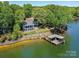 Lakeside home with private dock, lush yard, and outdoor living space at 2045 Manila Bay Ln, Tega Cay, SC 29708