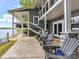 Inviting back porch with comfortable seating and scenic lake views, perfect for relaxing outdoors at 2045 Manila Bay Ln, Tega Cay, SC 29708