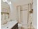 Cozy bathroom with decorative accents and tub/shower at 2045 Manila Bay Ln, Tega Cay, SC 29708