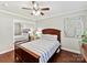 Comfortable bedroom with wood floors and a ceiling fan at 2045 Manila Bay Ln, Tega Cay, SC 29708