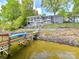 Waterfront home with multi-level deck, steps to the lake and private dock at 2045 Manila Bay Ln, Tega Cay, SC 29708