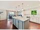 Open kitchen includes a large center island and a view of the lake at 2045 Manila Bay Ln, Tega Cay, SC 29708