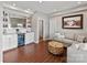 Stylish living room featuring a built-in bar, comfortable seating, and tasteful decor, perfect for entertaining guests at 2045 Manila Bay Ln, Tega Cay, SC 29708