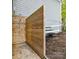 Private outdoor shower with wood enclosure, perfect for rinsing off after water activities at 2045 Manila Bay Ln, Tega Cay, SC 29708