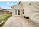 Cozy backyard featuring a concrete patio with a small storage unit at 2065 Taney Way, Indian Land, SC 29707