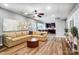 Open-concept living room flowing into a kitchen with stainless steel appliances and lots of counter space at 2065 Taney Way, Indian Land, SC 29707