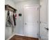 Mud room features hardwood floors, hanging rack for coats and aprons, and access to the garage at 2065 Taney Way, Indian Land, SC 29707