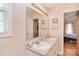 Bright bathroom boasts double sinks, neutral tones, and a large framed mirror at 216 Dewars Dr, Rock Hill, SC 29730