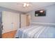 Comfortable bedroom featuring a ceiling fan, closet, and a wall-mounted television at 216 Dewars Dr, Rock Hill, SC 29730