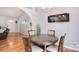 Open floor plan with dining area with modern accents and wood flooring at 216 Dewars Dr, Rock Hill, SC 29730