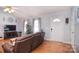 Inviting living room showcasing hardwood floors, vaulted ceilings, and natural light at 216 Dewars Dr, Rock Hill, SC 29730
