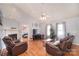 Bright living room with vaulted ceilings, fireplace, and hardwood floors at 216 Dewars Dr, Rock Hill, SC 29730