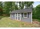 Well-maintained shed with classic gray siding and a durable metal roof at 216 Dewars Dr, Rock Hill, SC 29730