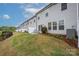 Backyard patio and yard area with well-maintained landscaping and lawn space at 23112 Clarabelle Dr, Charlotte, NC 28273