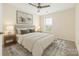 Cozy bedroom featuring neutral tones, a comfortable bed, and a serene ambiance at 23112 Clarabelle Dr, Charlotte, NC 28273