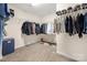 Walk-in closet with multiple hanging rods and shelving for optimal storage at 23112 Clarabelle Dr, Charlotte, NC 28273