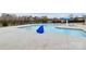 Outdoor community pool with a covered table and various metal safety features at 23112 Clarabelle Dr, Charlotte, NC 28273