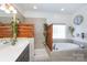 Bright bathroom with tub, shower and stylish glass block window at 234 Deal Estate Dr, China Grove, NC 28023