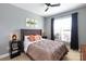 Bedroom featuring a comfortable bed, neutral tones, and ample natural light at 234 Deal Estate Dr, China Grove, NC 28023
