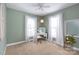 Bedroom with a vanity desk, ample natural light, and modern decor at 234 Deal Estate Dr, China Grove, NC 28023