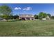 Beautifully landscaped home on a spacious lot with mature trees and well-maintained lawn at 234 Deal Estate Dr, China Grove, NC 28023