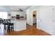 Spacious kitchen featuring a breakfast bar, white cabinets, and modern appliances at 234 Deal Estate Dr, China Grove, NC 28023