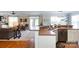 Kitchen view overlooking the living area, dining room, and access to the backyard at 234 Deal Estate Dr, China Grove, NC 28023
