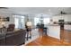 Open-concept living room with hardwood floors and easy flow to dining and kitchen at 234 Deal Estate Dr, China Grove, NC 28023