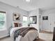 Bright bedroom featuring ample natural light from a double window and neutral decor at 2553 Fallbrook Nw Pl, Concord, NC 28027