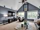 Inviting living room with vaulted ceilings, TV, and comfortable seating at 2553 Fallbrook Nw Pl, Concord, NC 28027