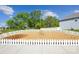Expansive backyard with white picket fence is ready for your imagination at 2573 Blue Sky Meadows Dr, Monroe, NC 28110