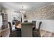 Elegant dining room with stylish decor and a brick accent wall at 2701 N Main Ave, Newton, NC 28658