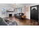 Cozy living room features a decorative fireplace and hardwood floors at 2701 N Main Ave, Newton, NC 28658