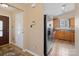 Inviting entryway leads to a spacious kitchen with stainless steel appliances and an abundance of natural light at 3005 Kansas City Dr, Monroe, NC 28110