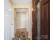 Welcoming foyer features tile flooring, neutral walls, and a wooden front door with leaded glass at 3005 Kansas City Dr, Monroe, NC 28110