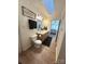 A bathroom with a double vanity, skylight, and black accents at 3032 Mckinney Rd, Shelby, NC 28152