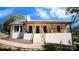 Charming white brick home with a covered porch and wooden accents at 3032 Mckinney Rd, Shelby, NC 28152